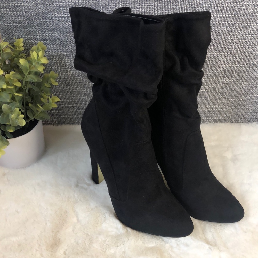 Never worn Black mid calf boots w/ 5” heel.